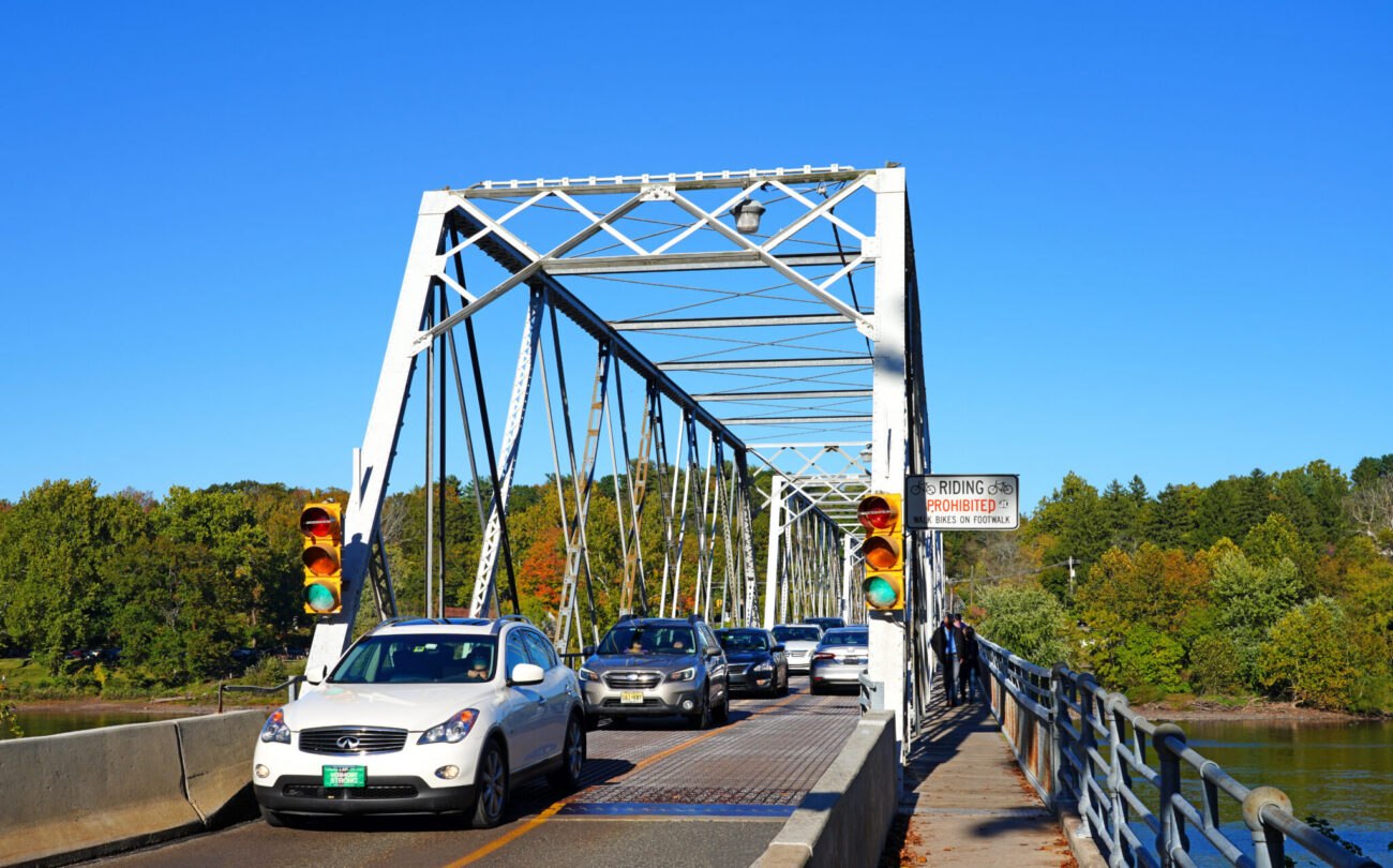The Washington Crossing Bridge today: historic 1905 iron truss, one lane each way, trucks banned